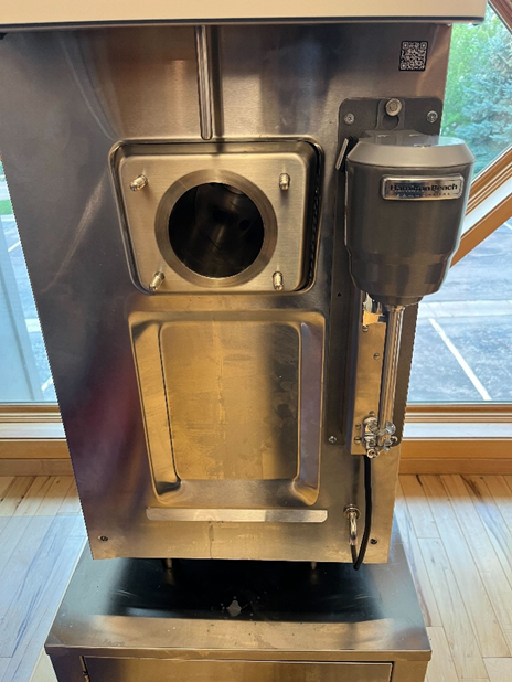 A machine with a hole in the middleAI-generated content may be incorrect.